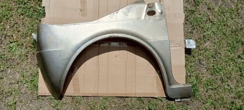 Fiat 126p STD blotnik lewy nowy