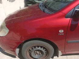 Toyota corolla e12 blotnik lewy